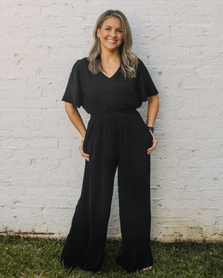 Uptown Elegance Smocked Jumpsuit in Black